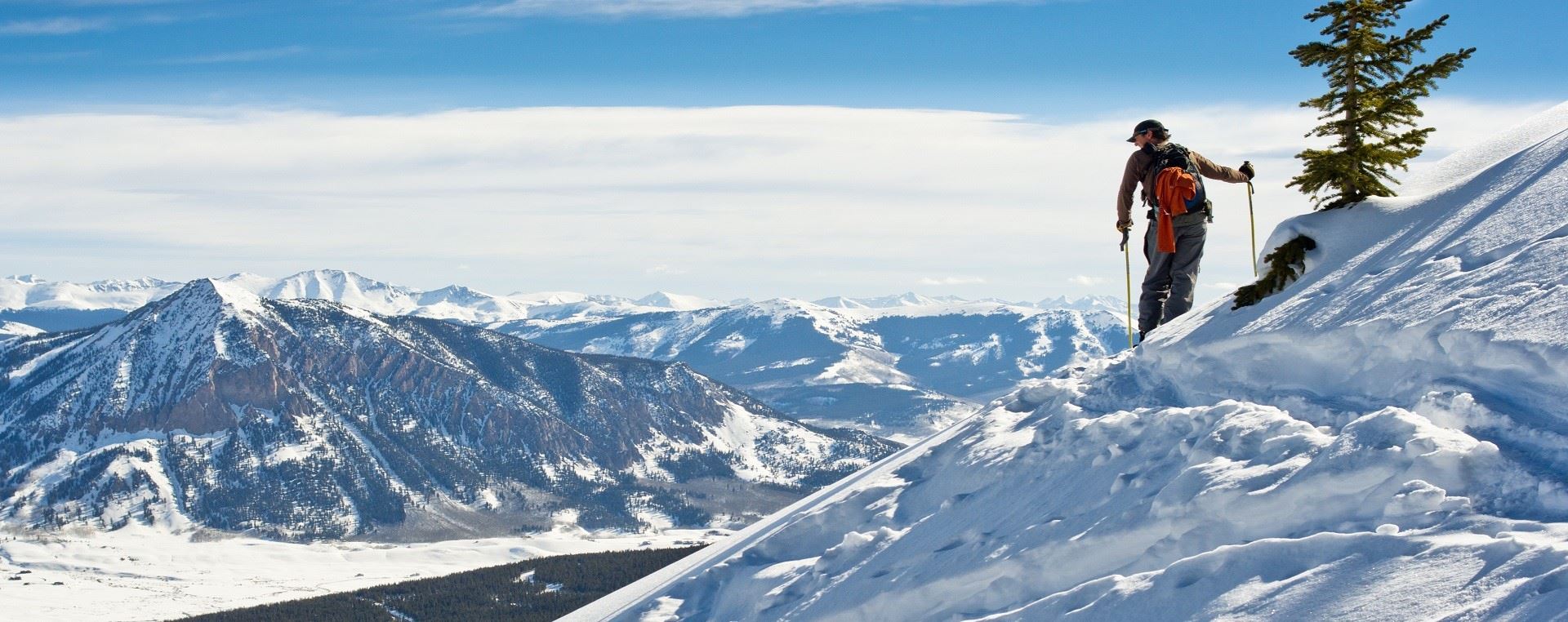 Man skiing on a snow covered mountain